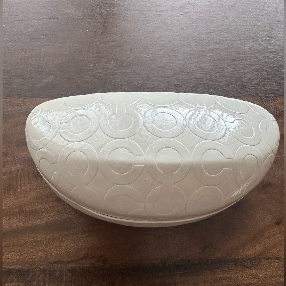 Authentic Coach sunglasses case.